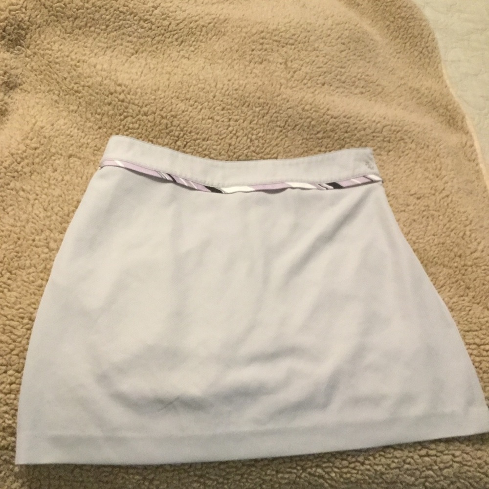 Izod golf skirt- never worn women's size 4